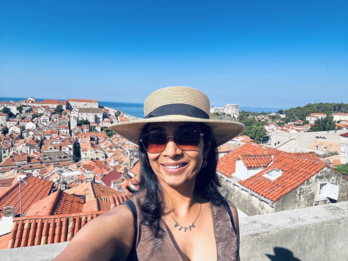 Selfie on Dubrovnik's city walls overlooking orange rooftops
