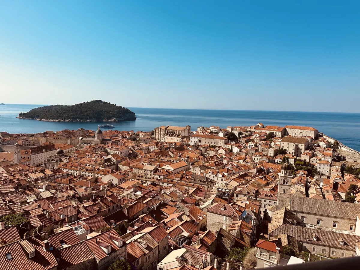 Rooftops with Lokrum island in the distance from the walls
