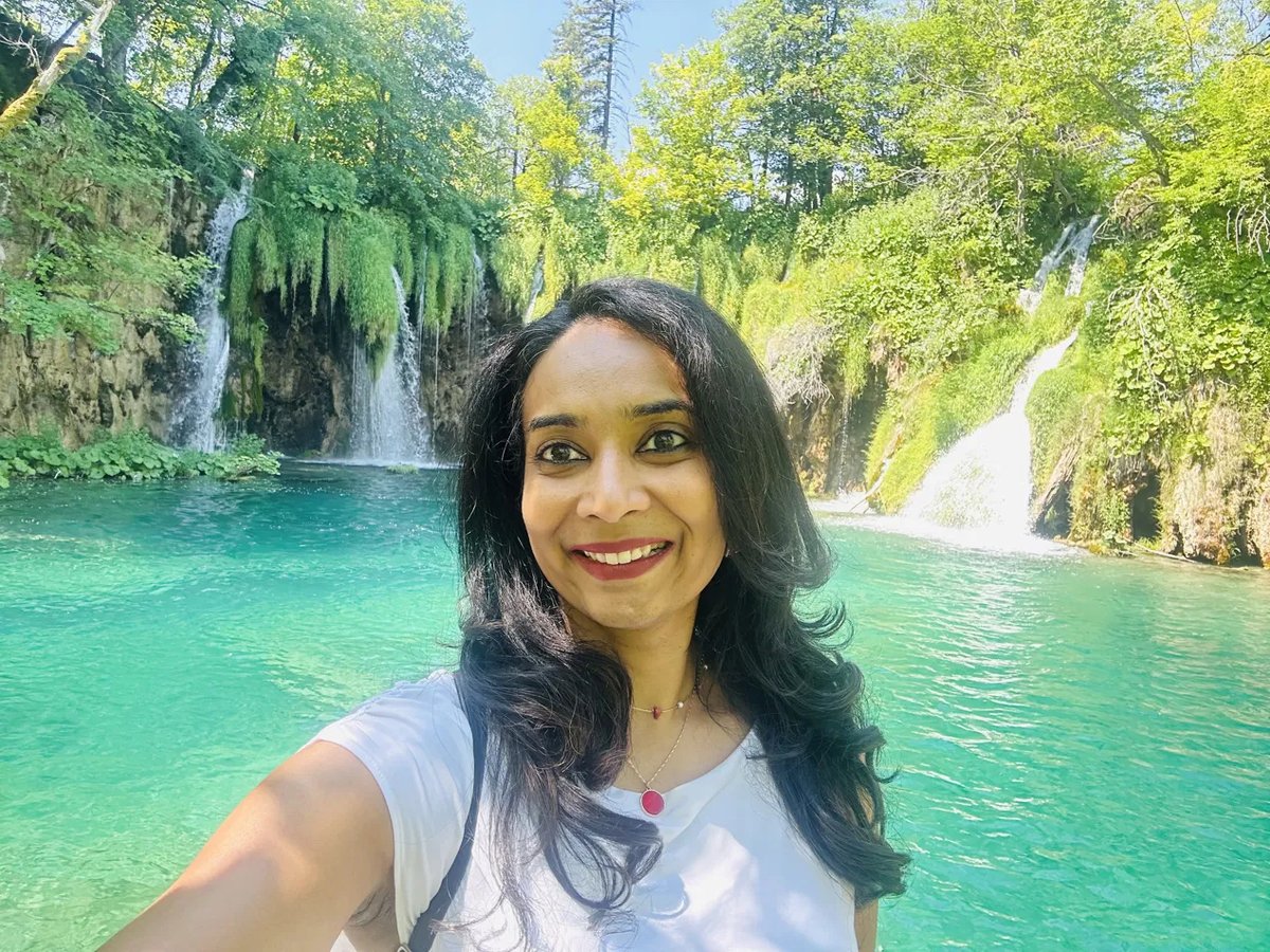 Selfie overlooking a Plitvice lake framed by waterfalls