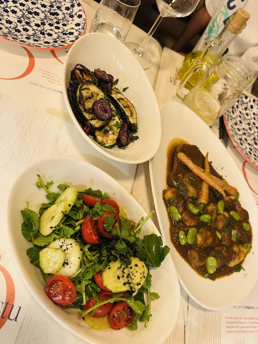 Multicourse dinner spread at Pusti Me Proć in Split