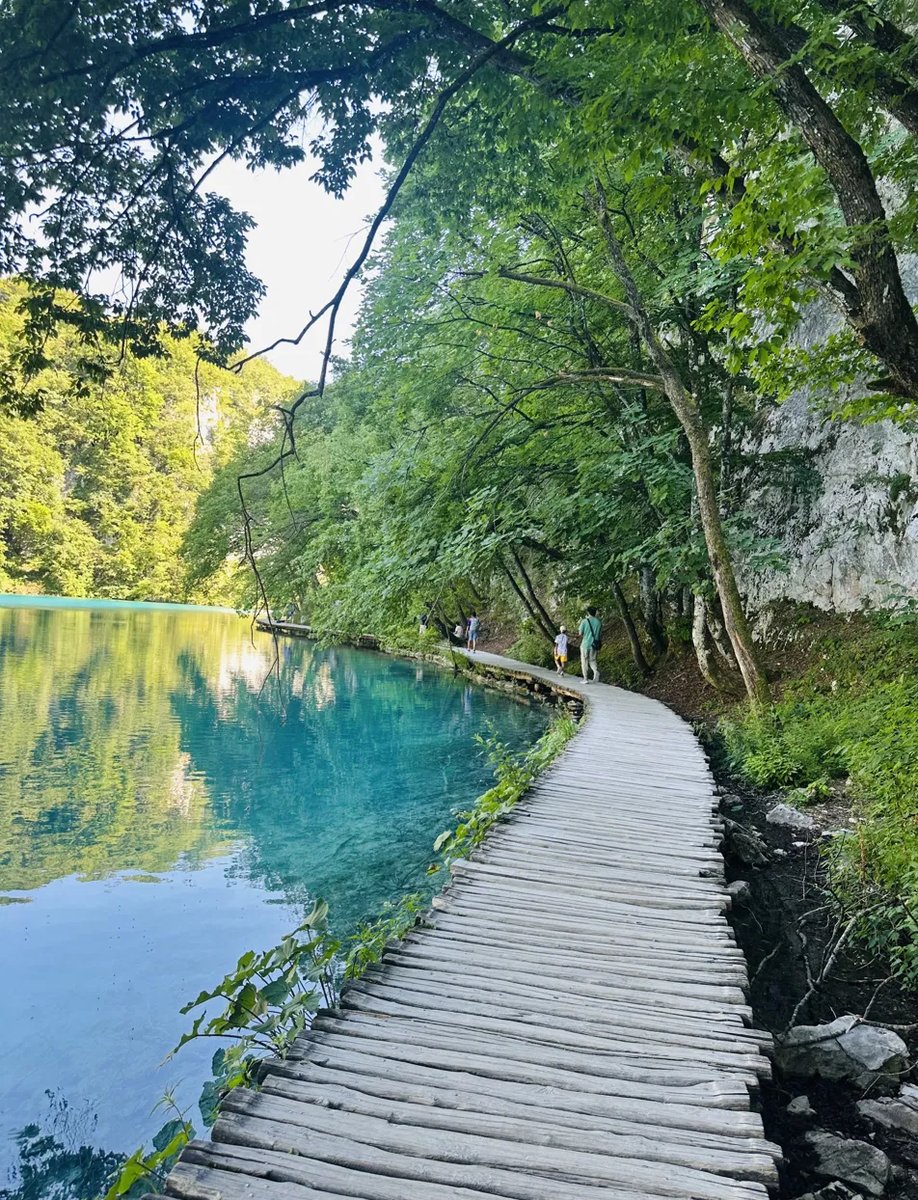 Boardwalk path along the turquoise lakes at Plitvice